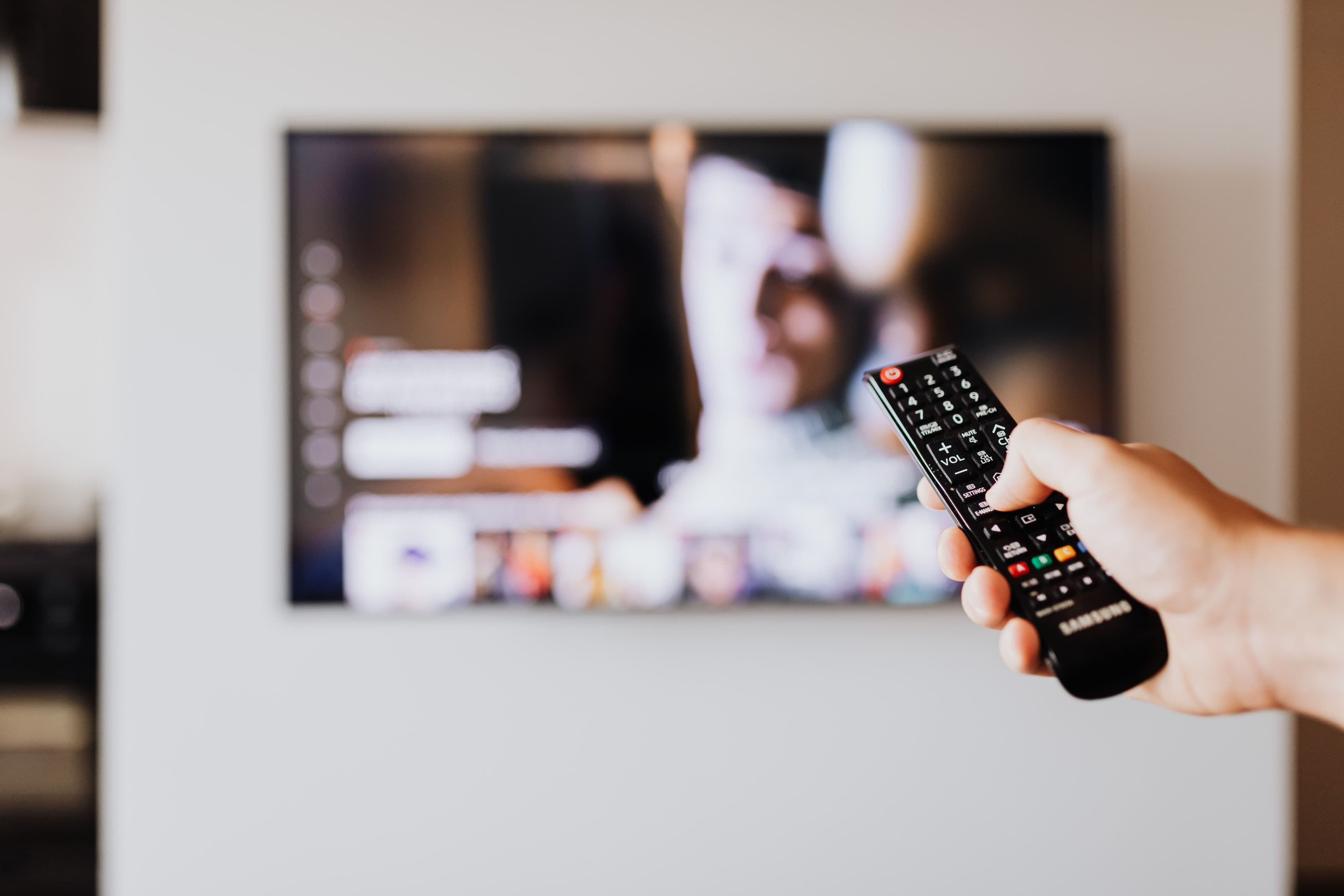 Television screen in a living room used as the main home viewing setup.