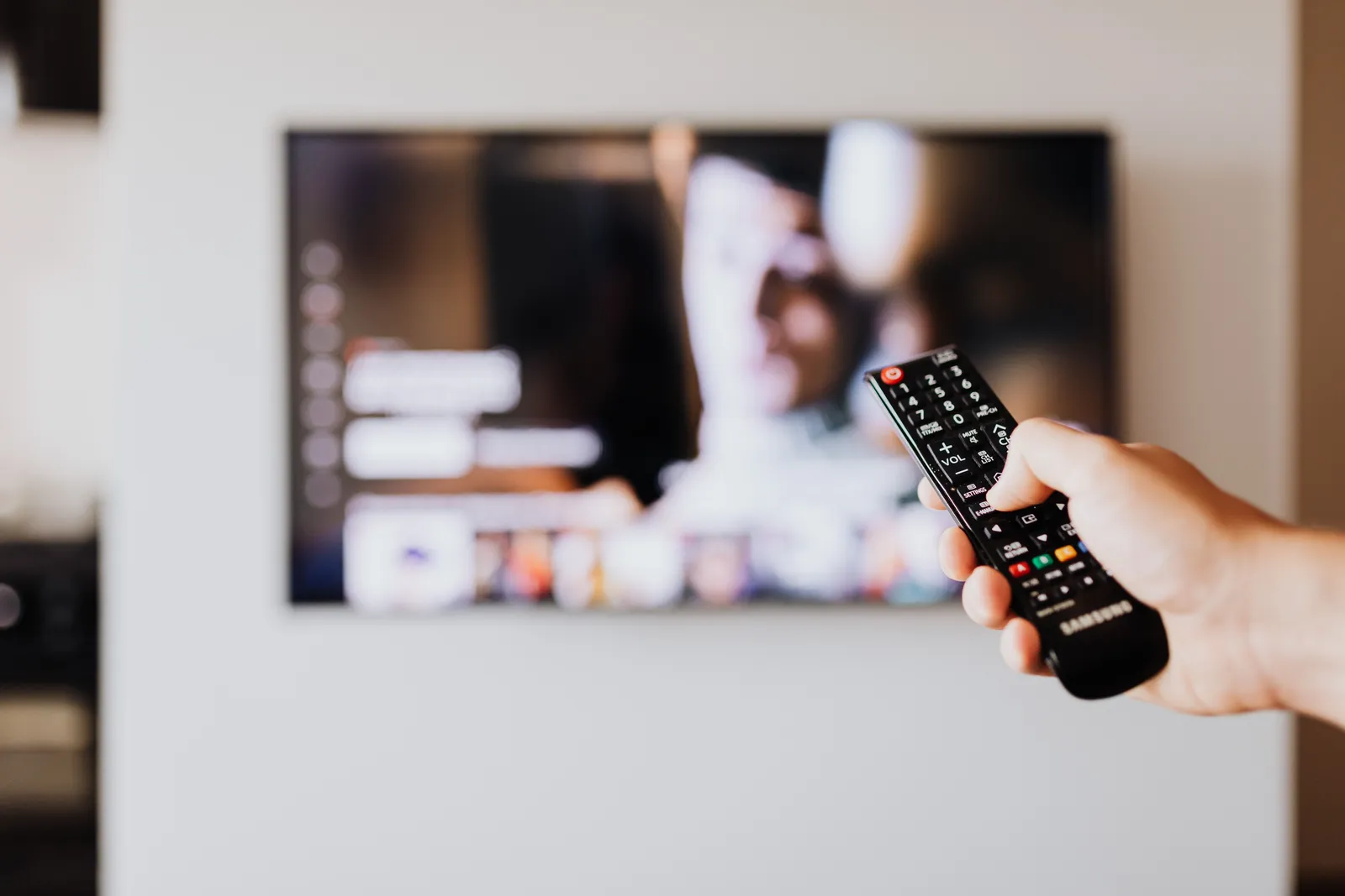 Television screen in a living room used as the main home viewing setup.